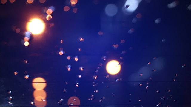 blurry lights on road in night city seamless loop
