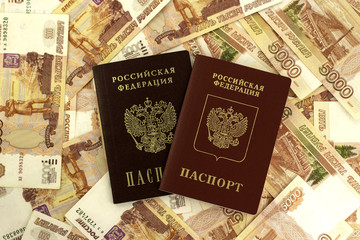 Russian foreign and domestic passport on a background of money
