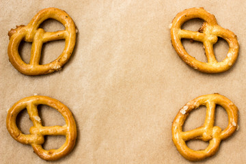 Pretzels on brown paper background