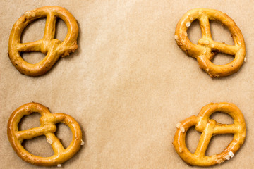 Pretzels on brown paper background