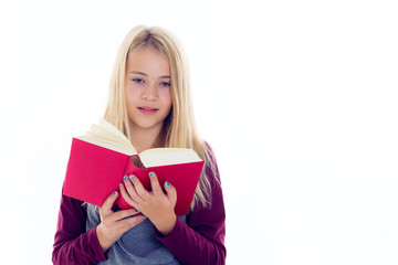 blond girl reading a book