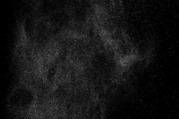 abstract splashes of water on a black background. splashes of milk. abstract spray of water. abstract rain. shower water drops.  white dust explosion. abstract texture. abstract black background. - obrazy, fototapety, plakaty