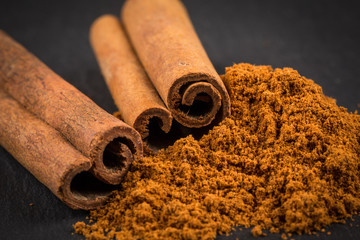 Cinnamon sticks with powder