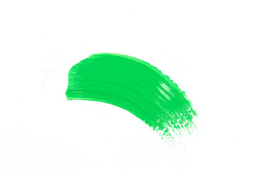 green stroke of the paint brush