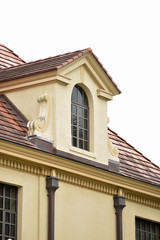 Stucco building with dormer in park, Gainesville, Florida