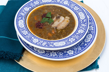 Traditional spanish lentils and sausage stew with pork