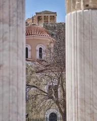Poster Athens Greece, view of acropolis between ancient Hadrian's library columns and an old church © Dimitrios