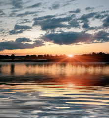 Obraz premium sunset on the river, Central Russia