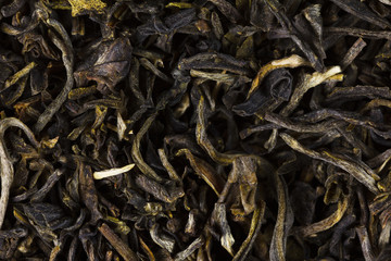 Green tea dry leaves. Macro, background