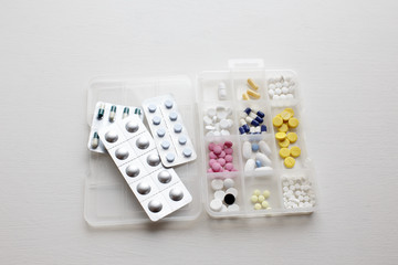 pill organizer. tablets and medicaments in a container for medicines