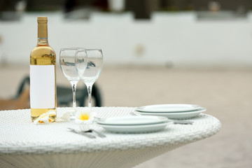 Wine bottle and glass on the table