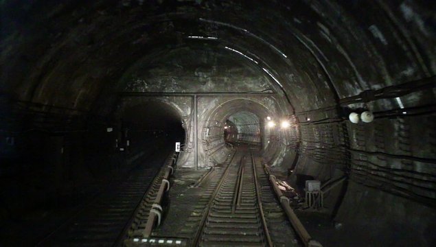 View along the subway tunnel from train driver cabin