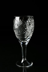 Empty glass on black background