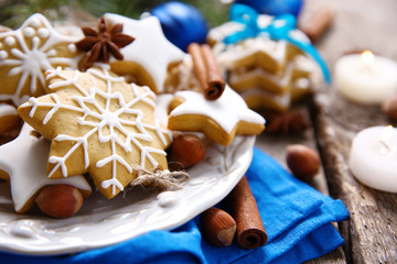 Cookies with spices and Christmas decor, on wooden table