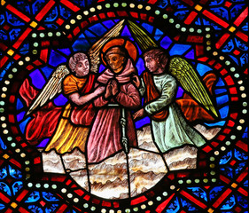 Stained Glass of a Catholic Saint and Angels in Cathedral of Leo