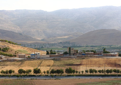 Village next to the high mountain, Farsan, Iran 