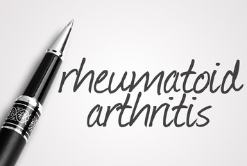 pen writes rheumatoid arthritis on white blank paper