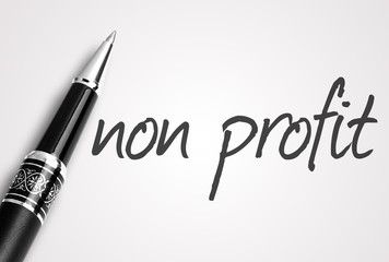 pen writes non profit on white blank paper - 95357330