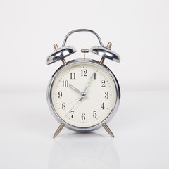 Alarm clock on white background