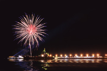 Beautiful Fireworks Festival in deep sea port.
