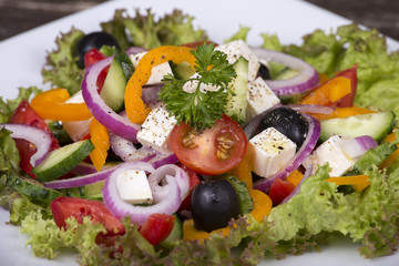 Fresh vegetable greek salad on the table