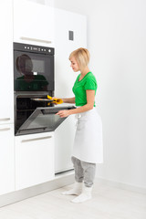 woman modern kitchen appliance setting