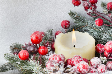 Christmas wreath from red berries, a fur-tree and cones