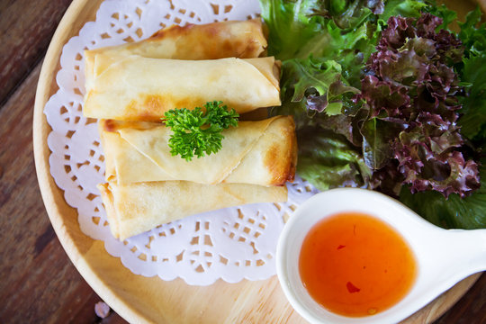fried spring rolls on wooden table