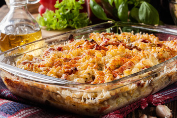 Casserole fusilli pasta with sausage, zucchini and cheese