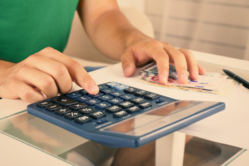 Calculating money, close up