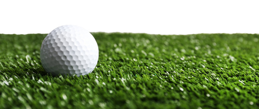 Golf ball on grass isolated on white