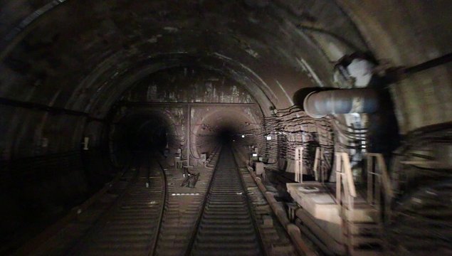 View along the subway tunnel from train driver cabin