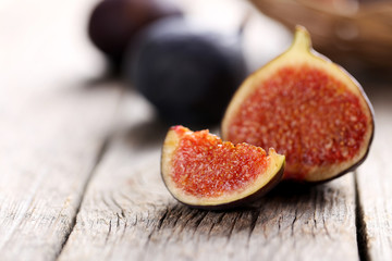 Fresh figs on a grey wooden table