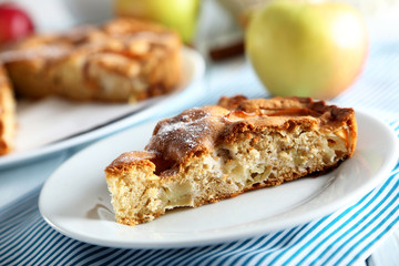 Homemade apple cake on blue wooden table