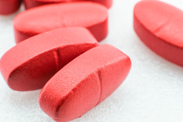 Obraz na płótnie Canvas red pills isolated