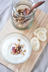 yogurt with granola on top view
