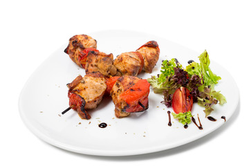 Delicious shish kebab on skewers.