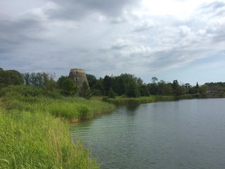 Fototapeta na wymiar tower on the lake beach