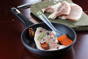 steak in a frying pan