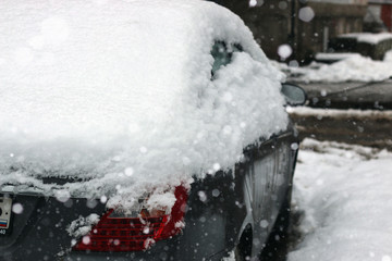 Naklejka na ściany i meble car covered with snow