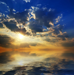 Naklejka na ściany i meble beautiful sunset with clouds. beautiful seascape 