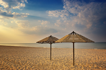 Empty beach. Umbrella on the beach