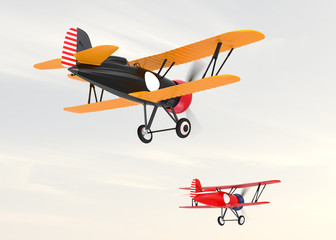 Two biplanes flying in the sky.