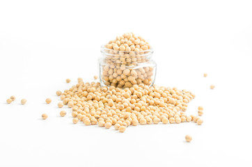soybeans in glass jar on white background..