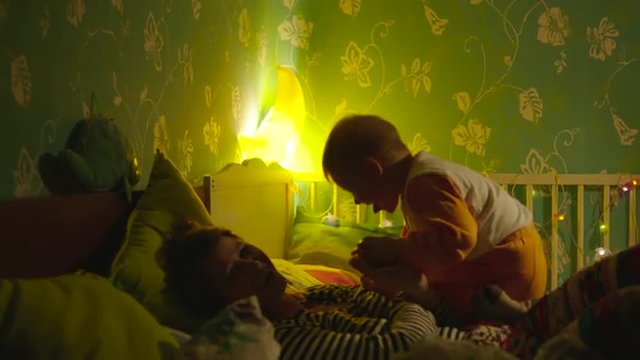 Boy Jumping in Bed slow