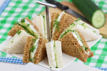 White and brown cream cheese and cucumber sandwiches
