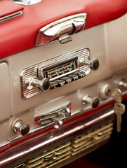 Old car radio in a classisc car.