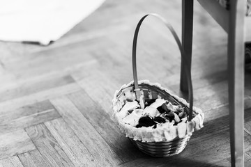 basket with rose petals