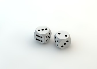 Two white dice thrown to reveal the values three and two