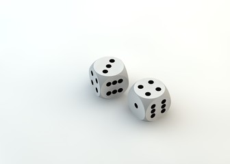 Two white dice thrown to reveal the values three and four